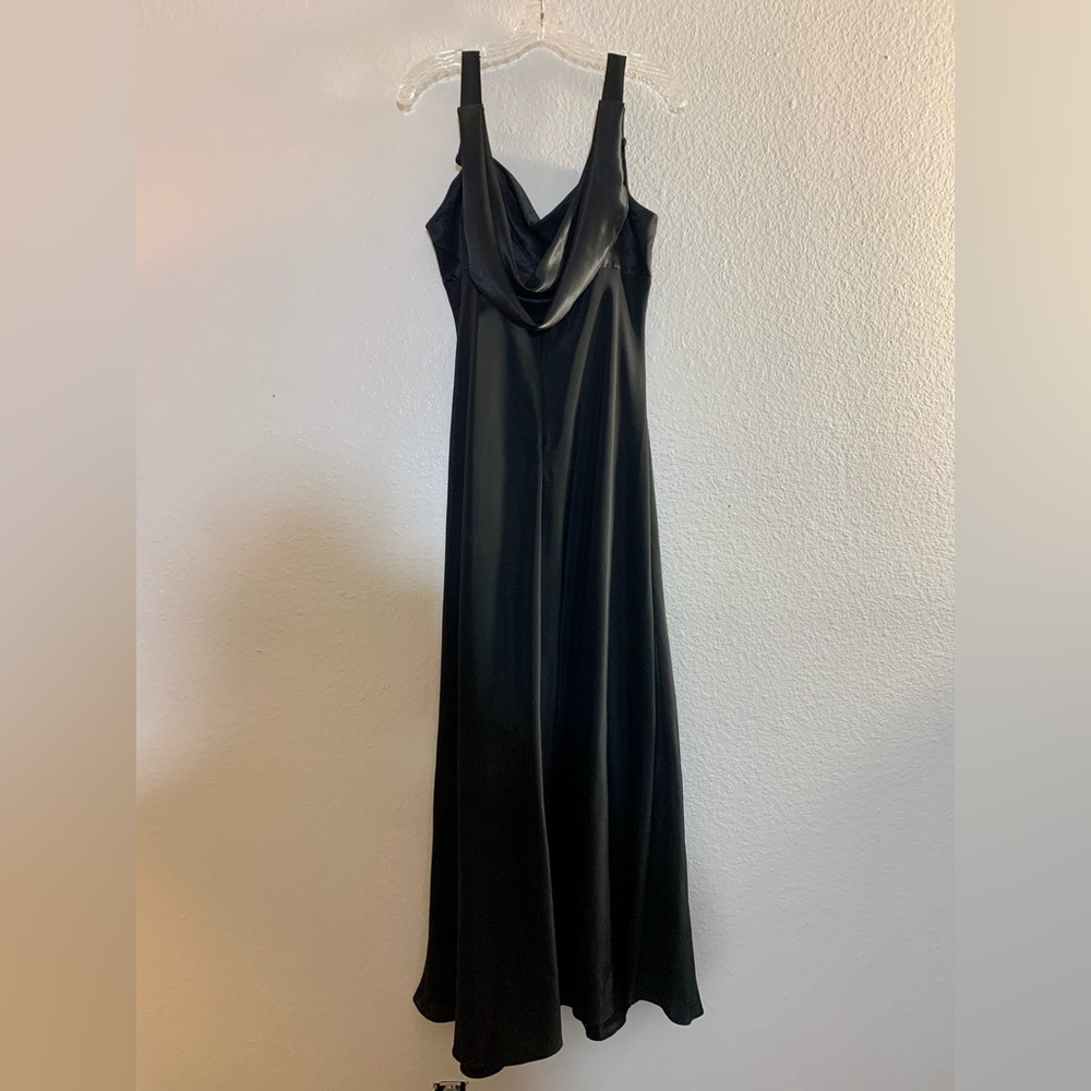 Black Evening Dress worn once.
Adjustable straps Room for bust,  slimming.